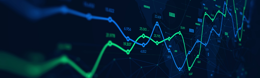 A digital screen shows a green line and a blue line showing the ups and down of financial markets